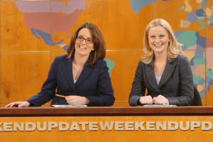 SATURDAY NIGHT LIVE -- Episode 7 -- Aired 12/11/2004 -- Pictured: (l-r) Tina Fey, Amy Poehler during "Weekend Update"  (Photo by Dana Edelson/NBCU Photo Bank/NBCUniversal via Getty Images via Getty Images)